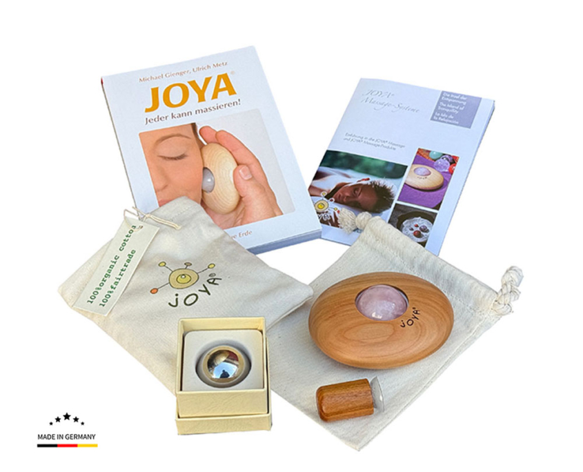 Verwöhn Massage Set mit Rosenquarzkugel, Edesltahlkugel, kleinem Buch über die JOYA Massagen und Wärmesäckchen.